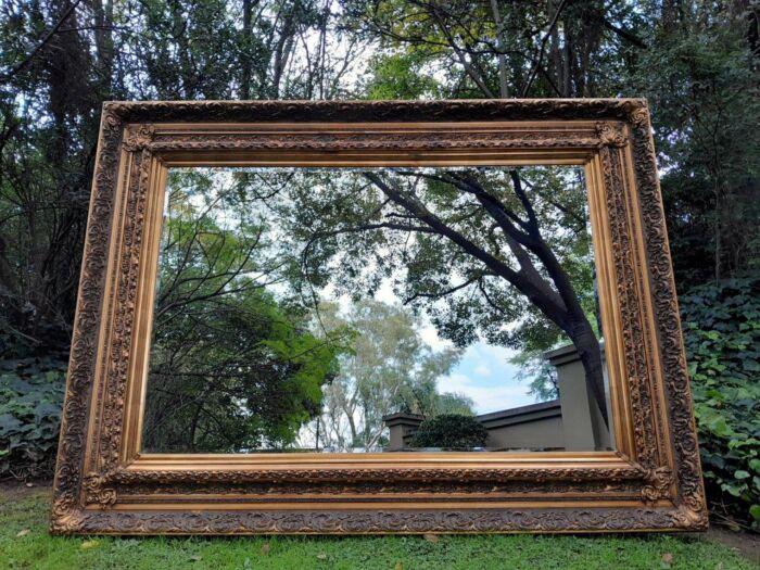 A 20th Century Heavily Carved And Bevelled Framed Mirror Of Large Proportions - Image 4