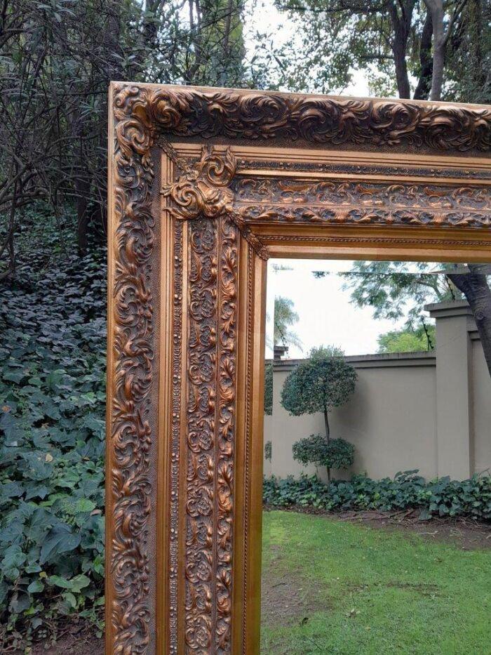 A 20th Century Heavily Carved And Bevelled Framed Mirror Of Large Proportions - Image 8