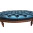 A 20th Century French Style Carved Beechwood Foot Stool Upholstered In Deep Buttoned Leather