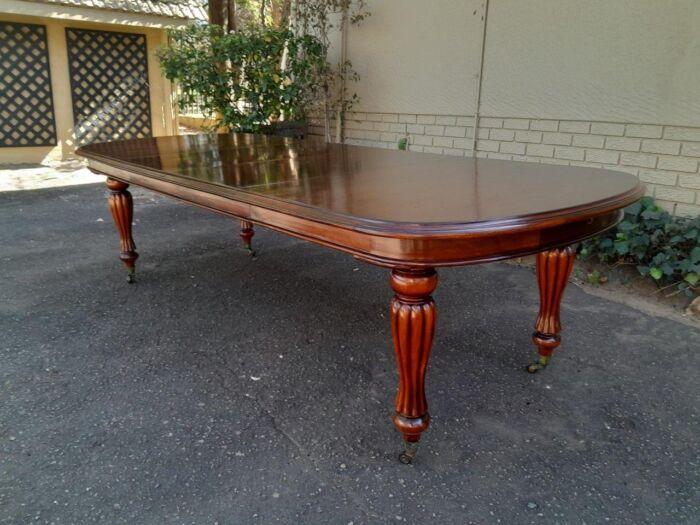 An Antique Victorian / Circa 1890s Dining Table With Two Leaves On Castors With A Crank Handle - Image 7