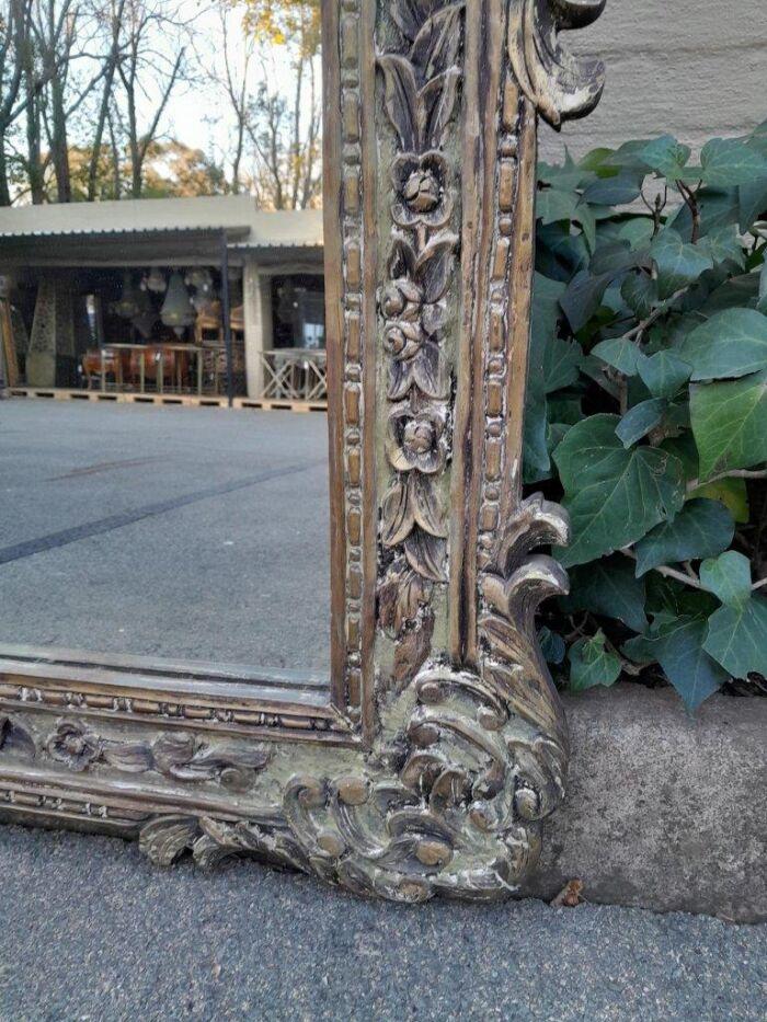 A 20th Century Victorian Style Heavily Carved Gilt And Green Mirror - Image 4