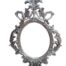 A French Style Ornately Carved And Bevelled Mirror In A Contemporary Silver Hand-Gilded Finish