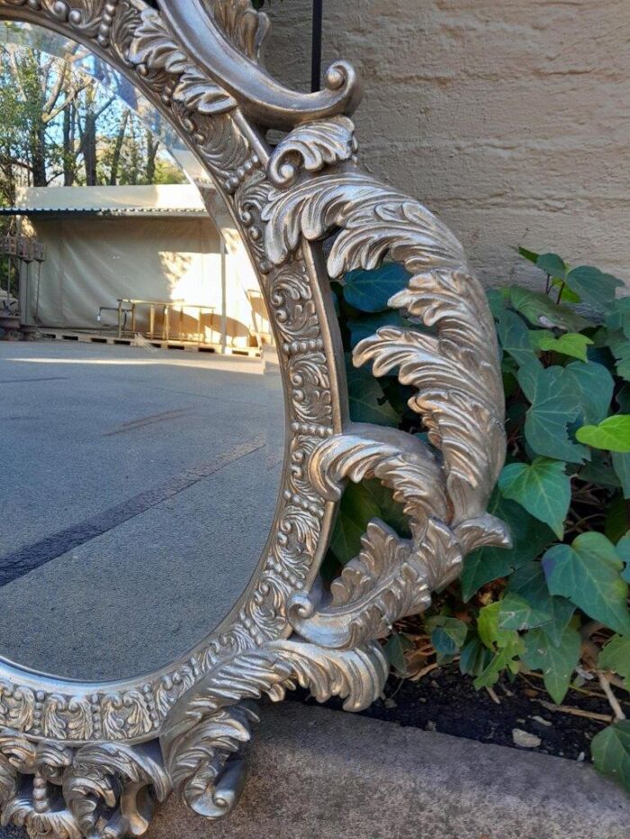 A French Style Ornately Carved And Bevelled Mirror In A Contemporary Silver Hand-Gilded Finish - Image 4