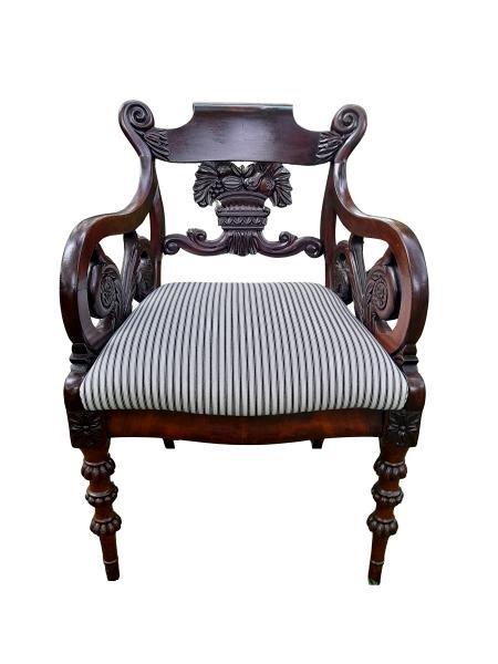 An Antique Mahogany Heavily Carved Armchair Upholstered Nd