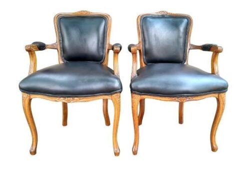 A Pair Of French Louis XVI Style Carved Wooden Armchairs Upholstered In Leather