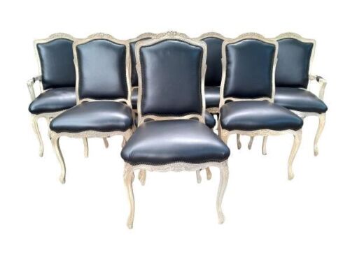 A French Provincial Set Of Eight Carved