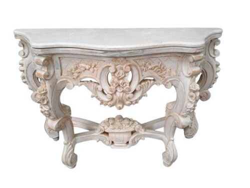 An Ornately Carved And Hand Gilded Console Table With Cream Marble Top