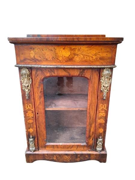A Marquetry Pier Cabinet With Ormolu Mounts And A Glazed Door