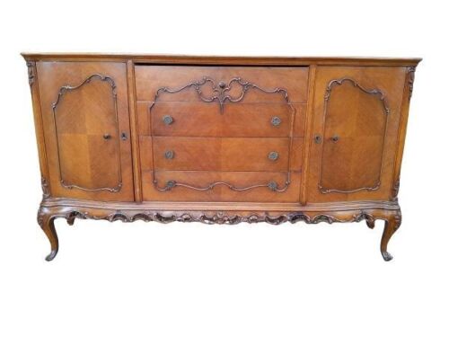 A 20th Century French Provincial Louis XV Style Walnut Sideboard With Four Drawers And Two Doors With Shelves In A Contemporary Bleached Finish