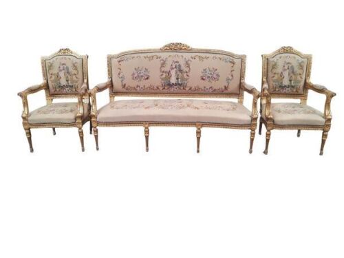 A 20TH Century Set Of French Napoleon III-Style Giltwood Needlepoint Tapestry Carved Settee And Armchairs Settee