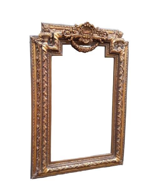 A 20th Century French Louis XVI Style Carved And Gilt Painted And Bevelled Mirror