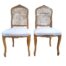 A Pair Of French Carved Walnut And  Rattan Back Chairs