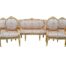 An Imported French Style Ornately Carved And Gilded Settee With Four Matching Armchairs