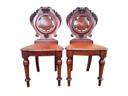A Pair Of Carved Rosewoo Hall Chairs