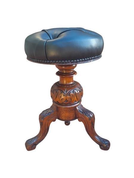 An Antique Victorian Carved Walnut Adjustable and  Revolving Piano Stool Upholstered in Leather