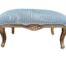 A French Style Gilded Ottoman Upholstered In A Ticking Stripe