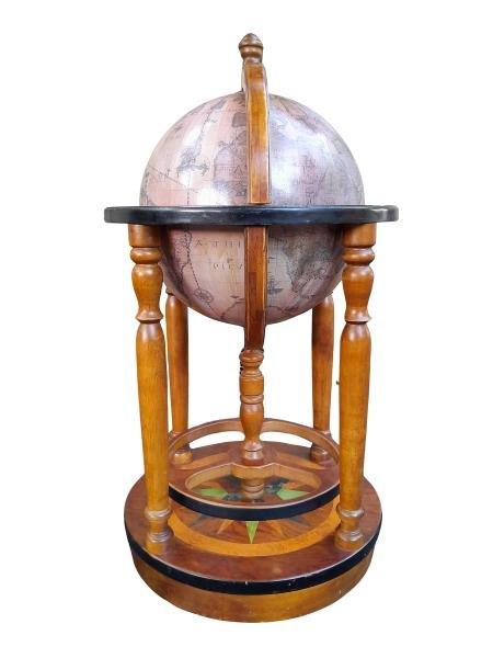 A 20TH Century Mahogany Globe Bar On Castors