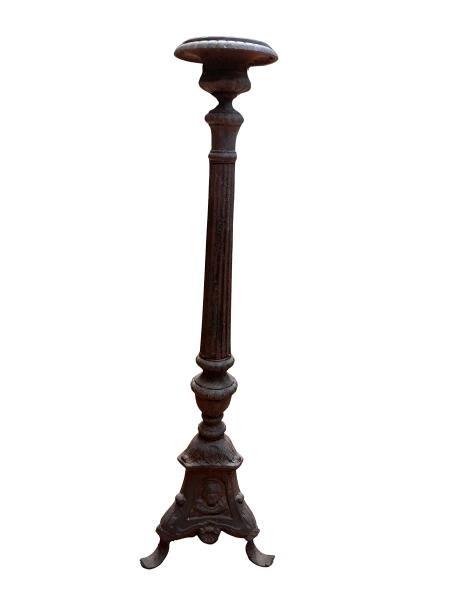 A 20TH Century Victorian Cast Iron Candle Holder