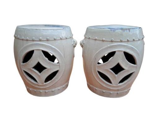 A 20th Century Pair Of Cream Ceramic Stools Or Side Tables