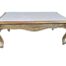 A French Style Gilt Coffee Table With Travertine Top
