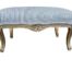A French Style Giltwood Ottoman Upholstered in Deep Button