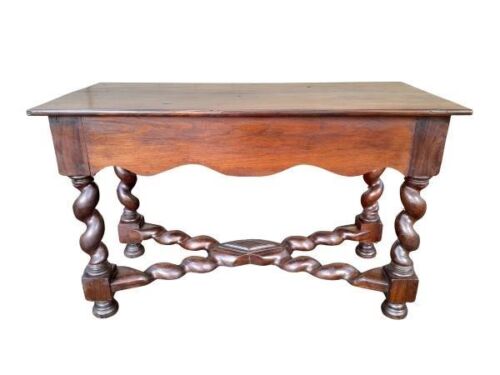 A 20th Century French Walnut Table With Stretcher Base