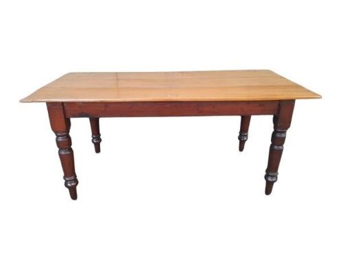A 20th Century Cape Yellowwood And Stinkwood Table (Eight Seater)