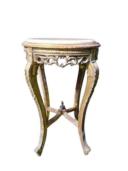 A French Style Carved Giltwood Table With Cream Marble Top
