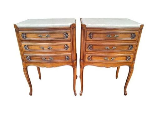 A 20th Century Pair Of French Walnut Pedestals With Cream Marble Tops