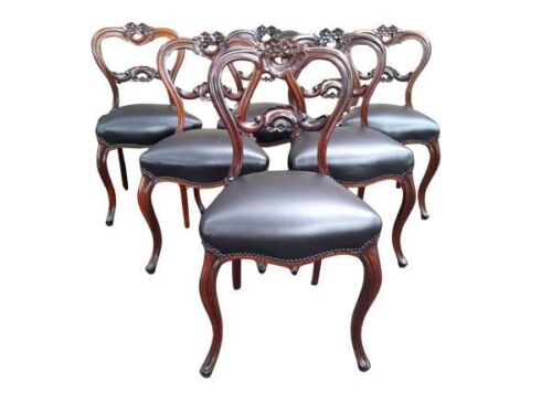 An Antique Victorian 19th / 20th Century Set Of Six Ornately Carved Walnut Balloon Back Dining Chairs In A Contemporary Bleached Finish And Upholstered In Leather