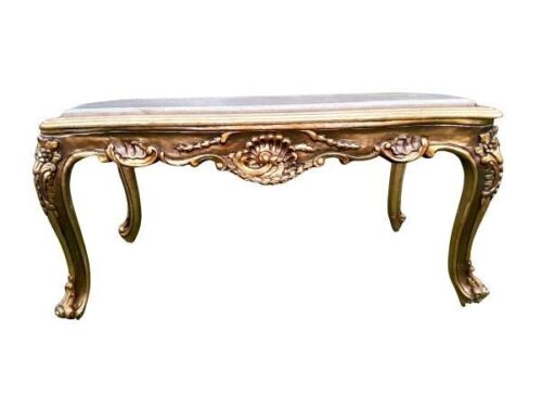 A 20th Century French Style Large Carved Giltwood Coffee Table With A Cream Marble Top