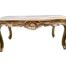 A 20th Century French Style Large Carved Giltwood Coffee Table With A Cream Marble Top