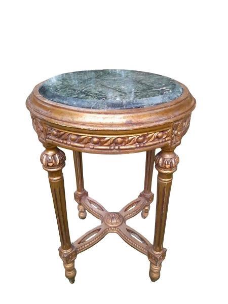 A French Style Carved Giltwood Table With A Marble Top