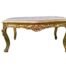 A French Style Carved And Giltwood Coffee Table With A Marble Top