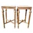A Pair Of French Style Ornately Carved Giltwood Tables With Cream Marble Tops