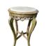 A French Style Carved Giltwood Table With A Cream Marble Top