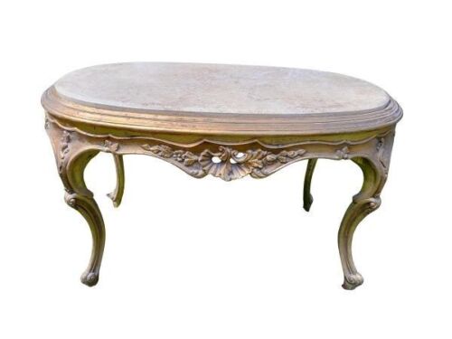 A French Style Carved Giltwood Oval Coffee Table With A Marble Top