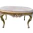 A French Style Carved Giltwood Oval Coffee Table With A Marble Top