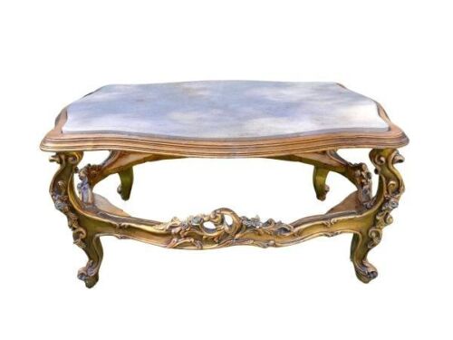 A French Style Carved Giltwood Coffee Table With A Marble Top