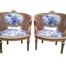 A Pair Of French Style Giltwood & Rattan Ornately Carved Armchairs In A French Blue And White Toile Fabric