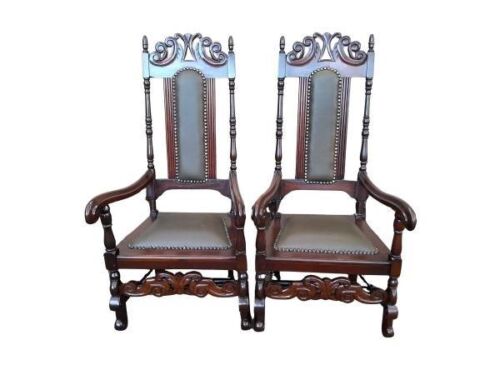 A 20TH Century Carved Pair of Stinkwood Throne/King Chairs with Original Leather Upholstery