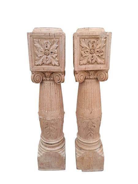 A 20TH Century Pair Or Ornately Carved Teak Pillars