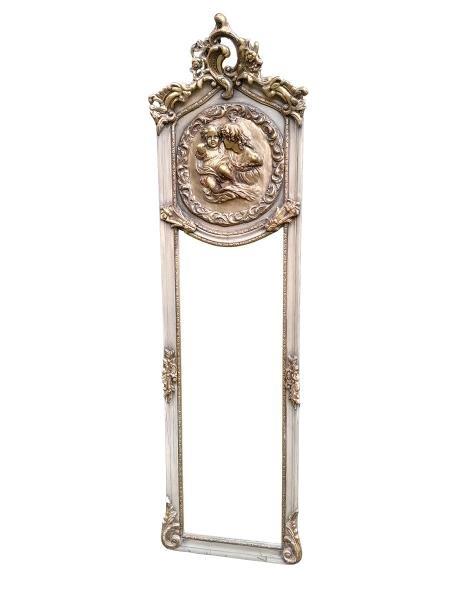 A French Ornate Rococo Style Carved Giltwood And Bevelled Mirror With Cherubs