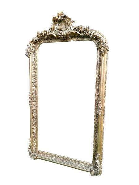 An Ornate Rococo Style Carved Giltwood And Bevelled Mirror