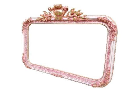 An Ornate Rococo Style Carved Giltwood And Bevelled Mirror