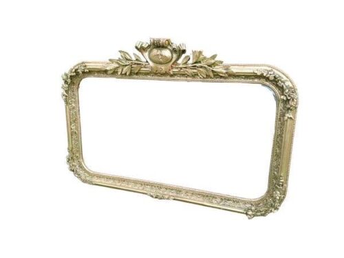An Ornate Rococo Style Carved Giltwood And Bevelled Mirror