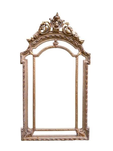 An Ornate Rococo Style Carved Giltwood And Bevelled Mirror