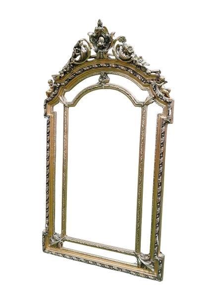An Ornate Rococo Style Carved Giltwood And Bevelled Mirror