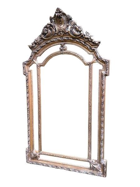 An Ornate Rococo Style Carved Giltwood And Bevelled Mirror