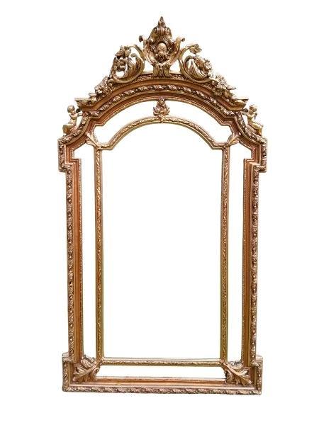 An Ornate Rococo Style Carved Giltwood And Bevelled Mirror